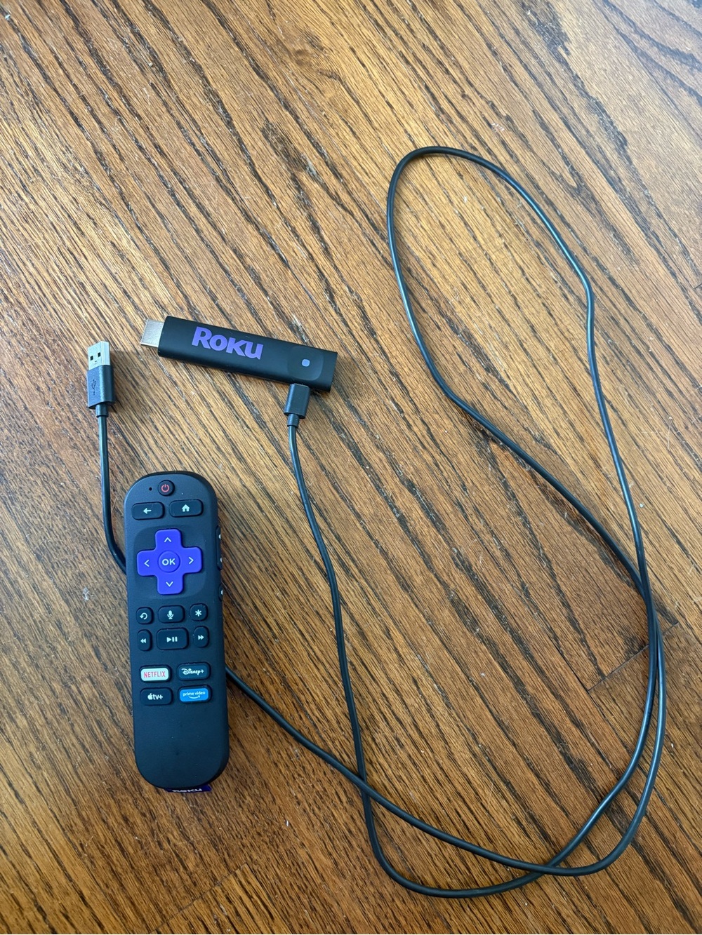 Roku Remote with Purple Directional Pad and Black Body